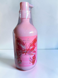 Champú nutritivo Selsebil Kiss Beauty La Bloom en envase rosa de 500ml con diseño de mariposa y dosificador