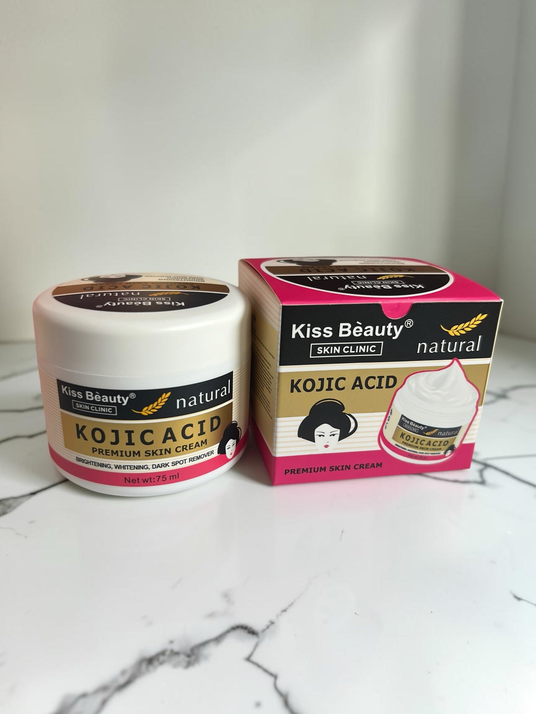 Crema facial Selsebil Kiss Beauty con ácido kójico en tarro blanco y caja rosa para aclarar manchas y unificar el tono
